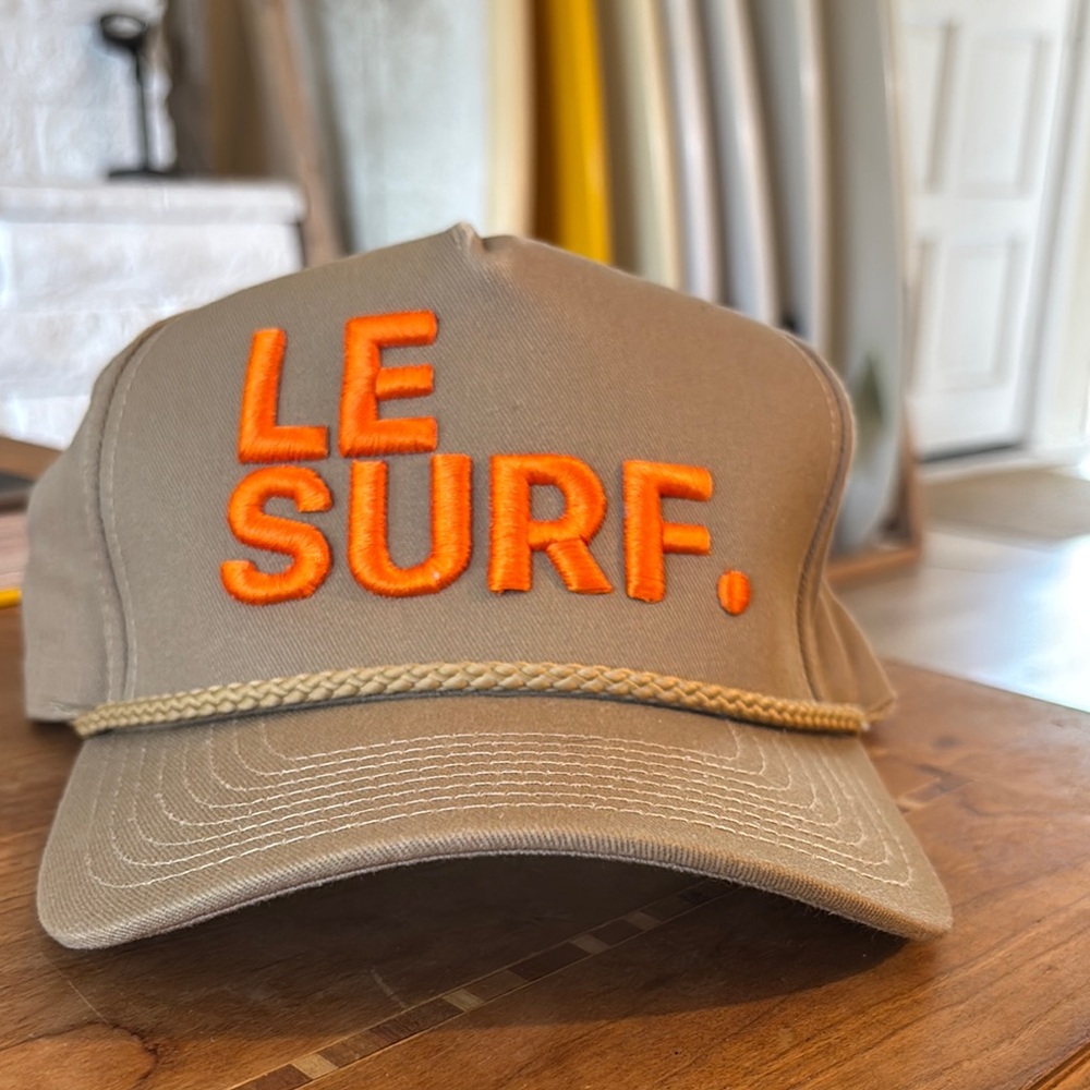 Tan and Orange Cap